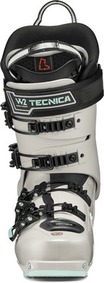 Ein grauer Tecnica Skischuh mit schwarzen Schnallen und Logo. Ein grauer Tecnica Skischuh mit schwarzen Schnallen und Logo.