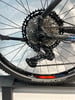 Hinterradschaltwerk mit Kassette und Kette an einem Mountainbike.