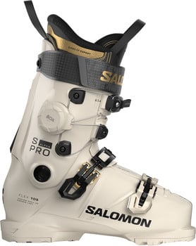 Ein beiger Salomon S/Pro Alpha Skischuh mit schwarzen und goldenen Details und Boa-System.