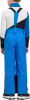 Rückansicht eines Jungen in blauer Skihose mit Trägern.