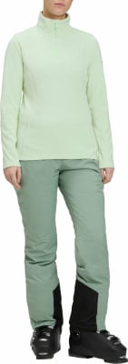 Damen hellgrüner Fleece-Pullover mit Stehkragen und grüner Skihose. Damen hellgrüner Fleece-Pullover mit Stehkragen und grüner Skihose.