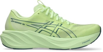 Grüner Laufschuh mit dunkelblauen Details und Markenlogo.