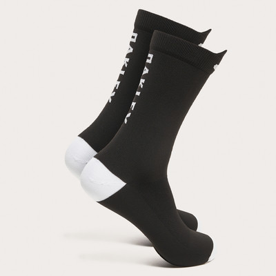 Schwarze Oakley-Socken mit weißem Logo und weißer Zehen- und Fersenpartie.