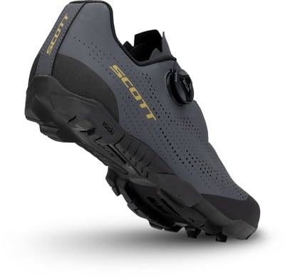 Grauer Scott Radschuh mit BOA-System und goldenem Logo.
