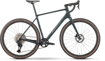 Dunkelgrünes Gravelbike mit braunen Reifen und schwarzer Ausstattung.