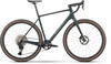 Dunkelgrünes Gravelbike mit braunen Reifen und schwarzer Ausstattung.