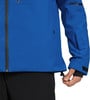 Eine blaue Jacke mit schwarzem Reißverschluss und verstellbarem Kordelzug am Saum.