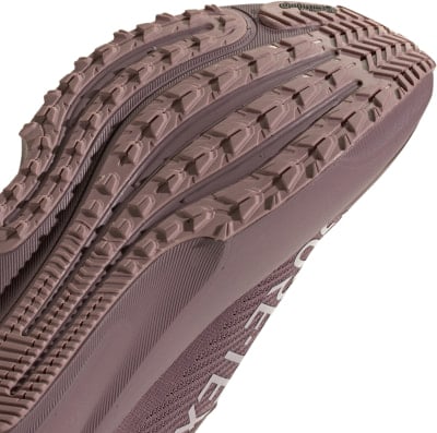 Laufschuhsohle in Rosa mit ausgeprägtem Profil für bessere Traktion. Laufschuhsohle in Rosa mit ausgeprägtem Profil für bessere Traktion.