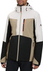 Ein Mann in einer weißen, beige und schwarzen Skijacke mit orangefarbenen Details.