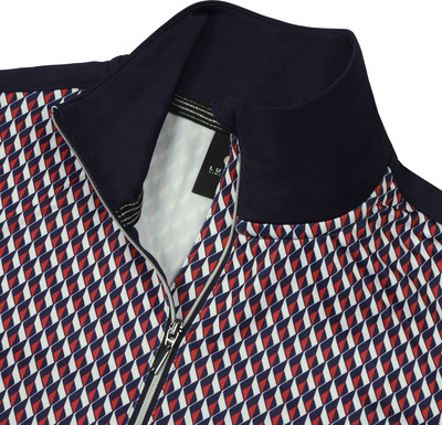Detail einer Jacke mit geometrischem Muster in Dunkelblau, Weiß und Rot. Detail einer Jacke mit geometrischem Muster in Dunkelblau, Weiß und Rot.