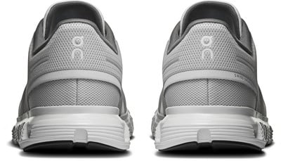 Rückansicht eines Paares grauer Laufschuhe mit weißer Sohle.