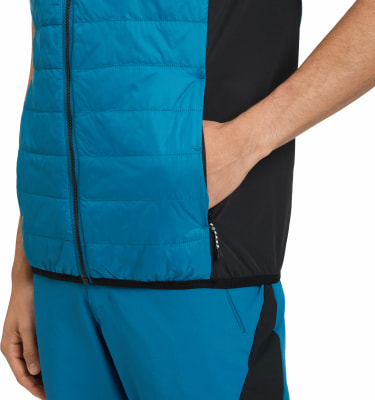 Mann in blauer Weste mit schwarzen Seiten und blauer Hose. Mann in blauer Weste mit schwarzen Seiten und blauer Hose.