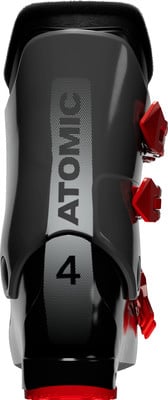 Rückansicht eines schwarzen Atomic-Skischuhs mit roten Schnallen und der Nummer 4. Rückansicht eines schwarzen Atomic-Skischuhs mit roten Schnallen und der Nummer 4.