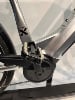 Nahaufnahme eines E-Bikes mit X-FACT-Logo und Kurbel.