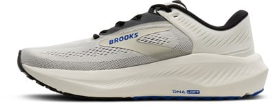 Weiße Brooks-Laufschuhe mit beiger Sohle und blauem Logo. Weiße Brooks-Laufschuhe mit beiger Sohle und blauem Logo.