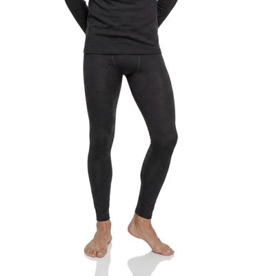 Männliche Beine in dunkler Thermounterhose auf weißem Hintergrund. Männliche Beine in dunkler Thermounterhose auf weißem Hintergrund.