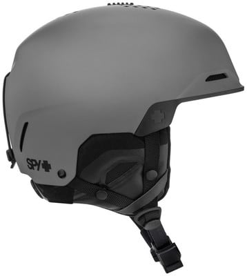 Ein grauer SPY+ Skihelm mit verstellbaren Riemen und Belüftung.