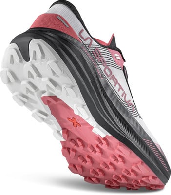 Weiße Laufschuhe mit rosa Akzenten und auffälliger Sohle.