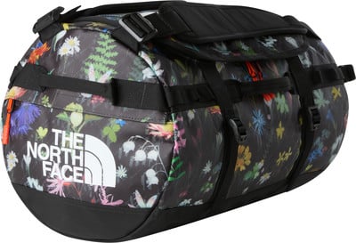 Schwarze The North Face Tasche mit Blumenmuster und weißem Logo. Schwarze The North Face Tasche mit Blumenmuster und weißem Logo.