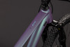 Detail eines Fahrradrahmens mit Farbverlauf und AIM-Logo.