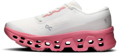 Weiße Laufschuhe mit pinker Sohle und Mesh-Obermaterial. Weiße Laufschuhe mit pinker Sohle und Mesh-Obermaterial.