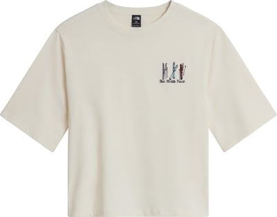 Beiges T-Shirt von The North Face mit Skiaufdruck und Schriftzug. Beiges T-Shirt von The North Face mit Skiaufdruck und Schriftzug.