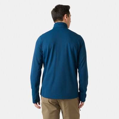 Mann von hinten in dunkelblauem Fleece und brauner Hose. Mann von hinten in dunkelblauem Fleece und brauner Hose.