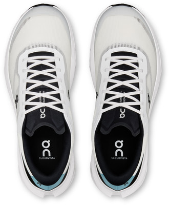 Weiße Laufschuhe mit schwarzen Details und ON Running Logo. Weiße Laufschuhe mit schwarzen Details und ON Running Logo.