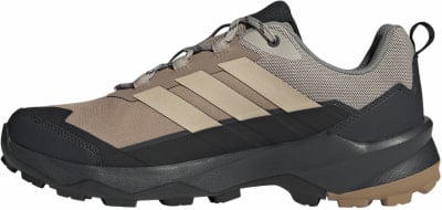 Brauner Herren-Wanderschuh von Adidas mit beige Streifen und schwarzer Sohle. Brauner Herren-Wanderschuh von Adidas mit beige Streifen und schwarzer Sohle.