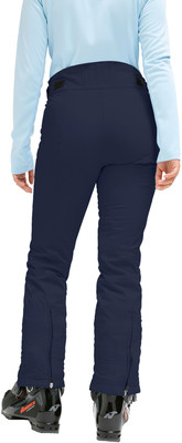 Rückansicht einer Person in dunkelblauer Skihose und hellblauem Oberteil. Rückansicht einer Person in dunkelblauer Skihose und hellblauem Oberteil.