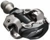 Nahaufnahme eines Shimano Deore XT Fahrradpedals.