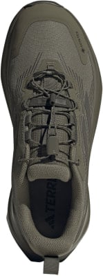 Grüner Outdoor-Schuh mit Schnellverschluss und Gore-Tex-Logo. Grüner Outdoor-Schuh mit Schnellverschluss und Gore-Tex-Logo.