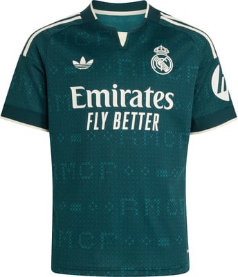 Grünes Real Madrid Fußballtrikot mit Adidas-Logo und Emirates-Sponsor. Grünes Real Madrid Fußballtrikot mit Adidas-Logo und Emirates-Sponsor.