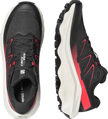 Fekete Salomon Ultra Flow 2 futócipő piros részletekkel, fehér talpon. Fekete Salomon Ultra Flow 2 futócipő piros részletekkel, fehér talpon.