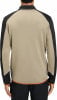 Rückansicht einer beige Jacke mit schwarzen Ärmeln.