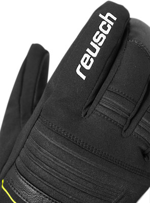 Schwarze Handschuhe mit weißem Reusch-Aufdruck und gelbem Detail. Schwarze Handschuhe mit weißem Reusch-Aufdruck und gelbem Detail.