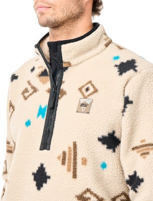 Beige Fleecejacke mit Reißverschluss und geometrischem Muster.
