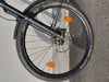 Detail eines Mountainbike-Vorderrads mit Schutzblech und Scheibenbremse.