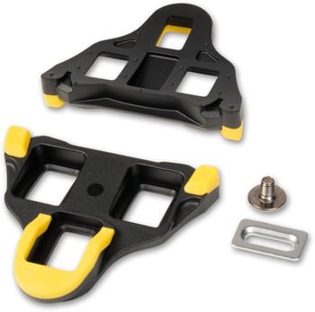 Zwei schwarze Fahrradklickpedale mit gelben Elementen und Montageschraube mit Unterlegscheibe.