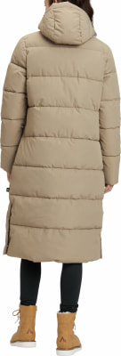 Damen-Steppmantel in Beige mit Kapuze und schwarzen Leggings. Damen-Steppmantel in Beige mit Kapuze und schwarzen Leggings.