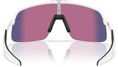 Sportbrille mit weißem Rahmen und pinkfarbenen Gläsern mit Violett-Tönung. Sportbrille mit weißem Rahmen und pinkfarbenen Gläsern mit Violett-Tönung.