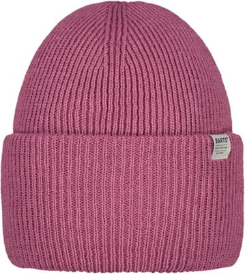 Eine rosa Strickmütze mit dem Barts-Logo an der Seite. Eine rosa Strickmütze mit dem Barts-Logo an der Seite.