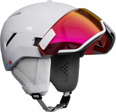 Weißer Atomic Savor GT Skihelm mit rosafarbenem Visier und Riemen. Weißer Atomic Savor GT Skihelm mit rosafarbenem Visier und Riemen.