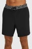 Schwarze Badeshorts für Herren mit Blumenmuster am Bund und Kordelzug.