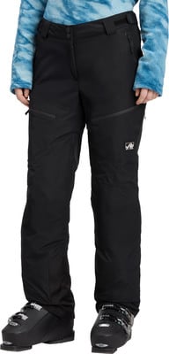 Schwarze Skihose mit blauem Oberteil und Skischuhen. Schwarze Skihose mit blauem Oberteil und Skischuhen.