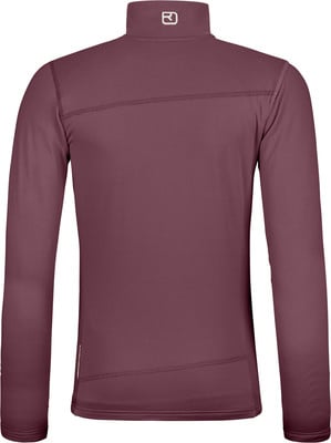 Damen-Langarmshirt in Dunkelrosa mit hohem Kragen und Logo. Damen-Langarmshirt in Dunkelrosa mit hohem Kragen und Logo.