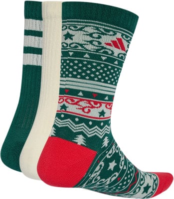 Drei Paar Weihnachtssocken mit verschiedenen Mustern, einschließlich Adidas-Logo. Drei Paar Weihnachtssocken mit verschiedenen Mustern, einschließlich Adidas-Logo.