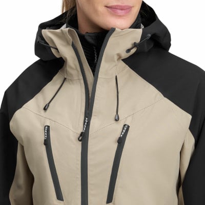 Damenjacke mit Kapuze, kontrastierenden schwarzen Ärmeln und beige Körper. Damenjacke mit Kapuze, kontrastierenden schwarzen Ärmeln und beige Körper.