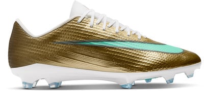 Zlaté futbalové kopačky Nike s tyrkysovým swooshom a bielou podrážkou.