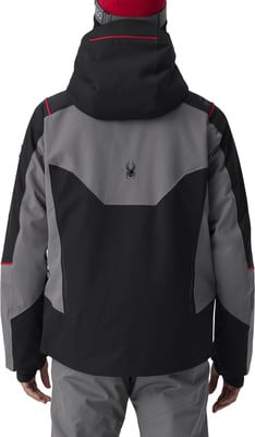 Rückansicht einer schwarz-grauen Skijacke mit Spyder-Logo. Rückansicht einer schwarz-grauen Skijacke mit Spyder-Logo.
